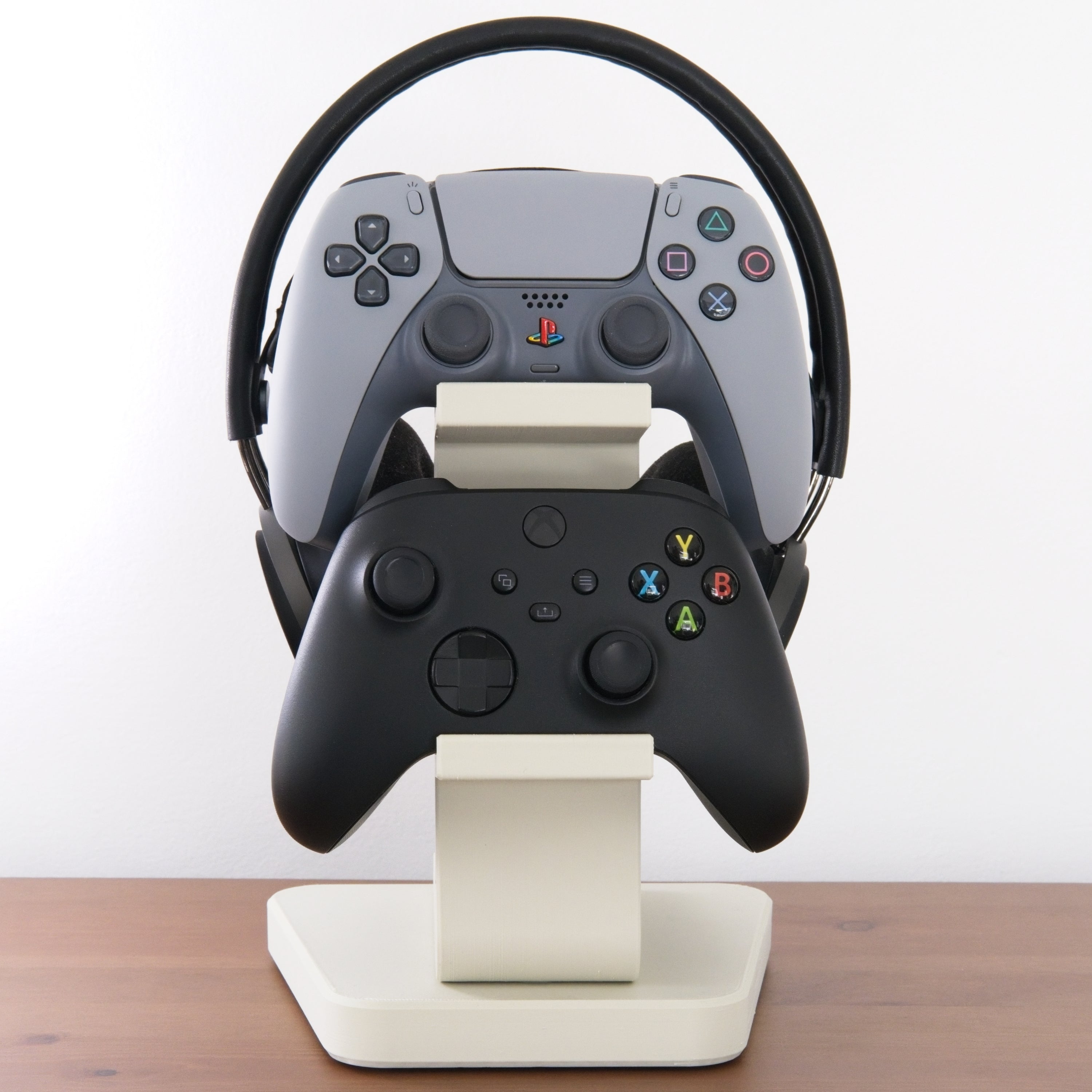 All-in-One Headset and Controller Gaming Stand with headsets and controllers organized neatly.