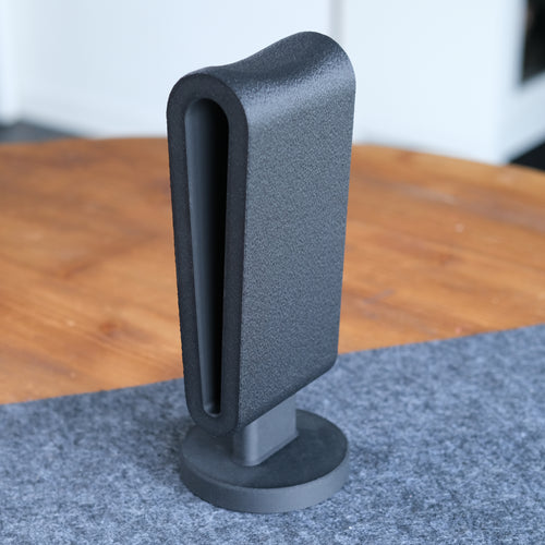 Stylish Headphone Display Stand designed to enhance workspace aesthetics and functionality.