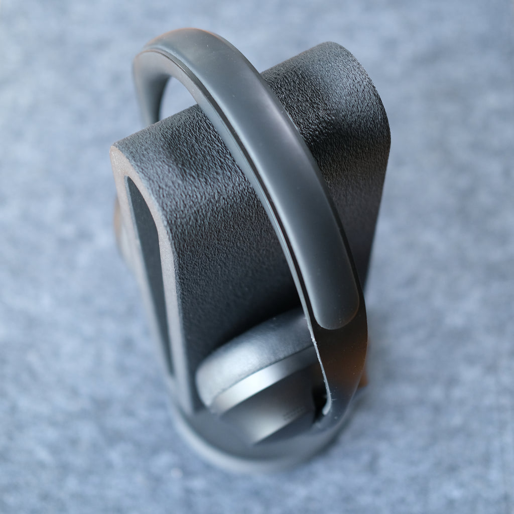 Close-up of a sleek Headphone Display Stand showcasing its modern design and smooth finish.